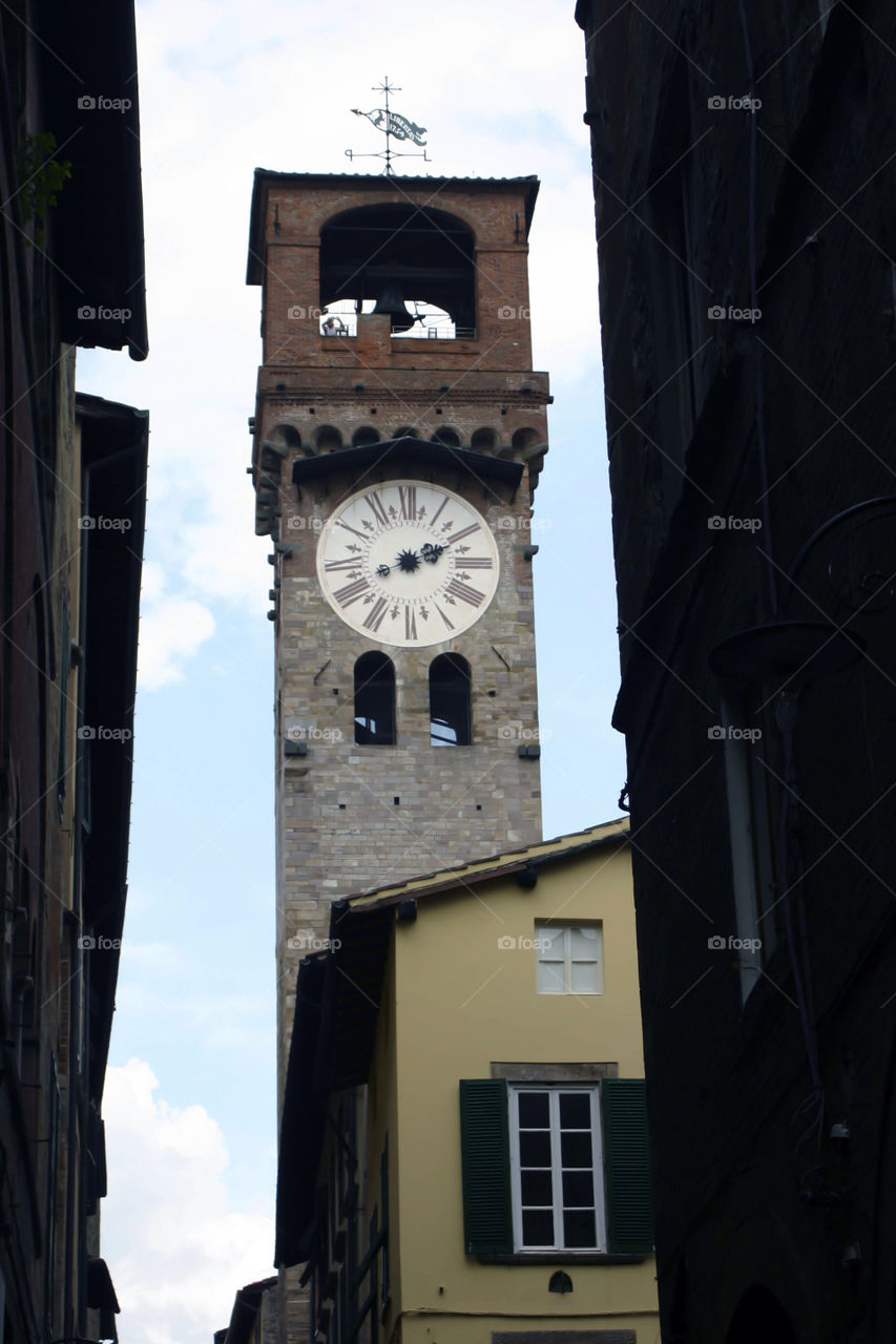 Lucca, Clock tower. Tourism in Italy. Lucca, Tuscany