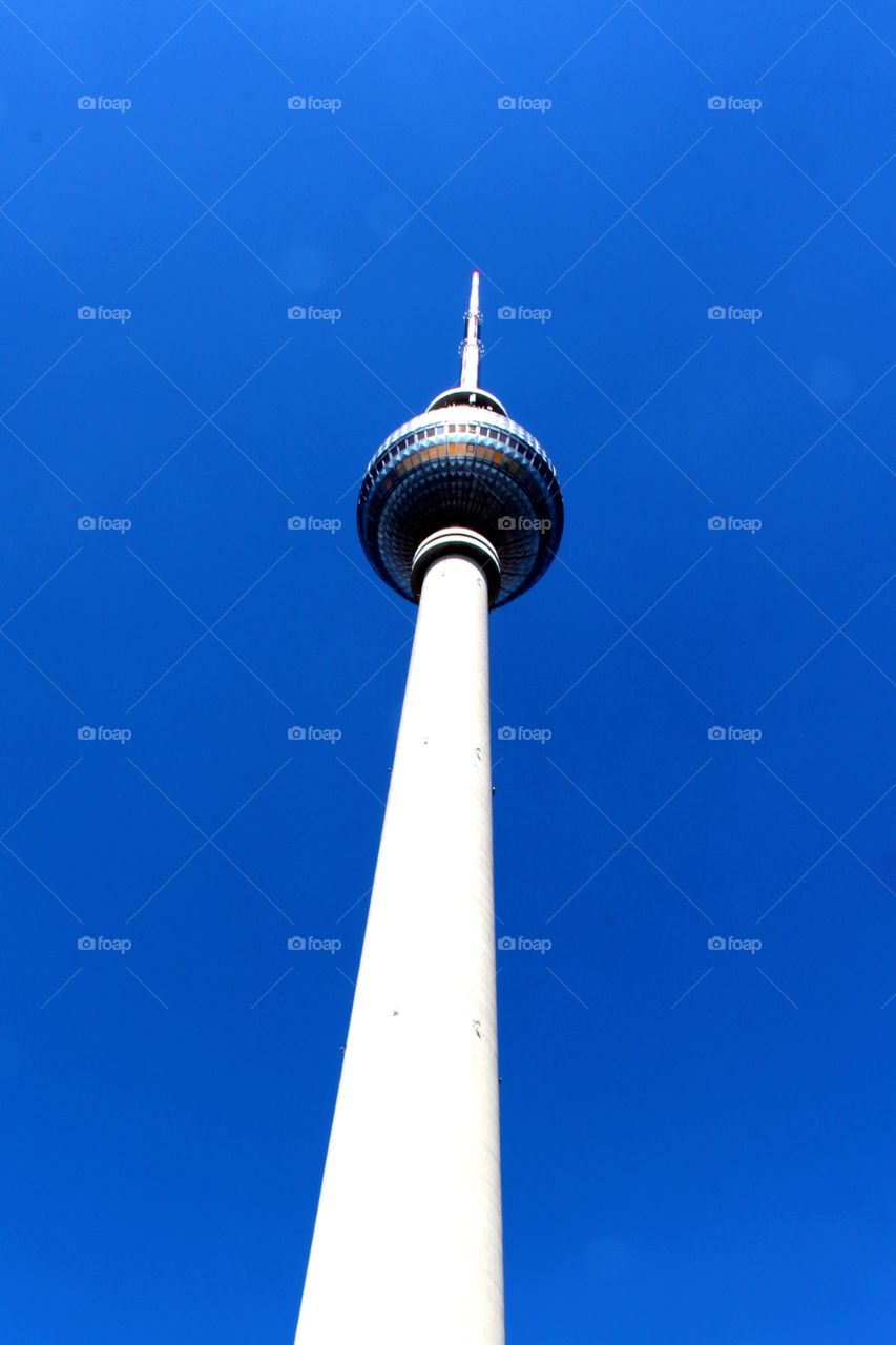 Looking up at Berlin. The view of the Berlin Fernsehturm from below