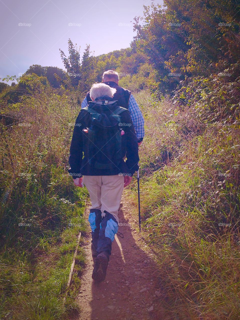 Elderly gentleman hiking in the uk