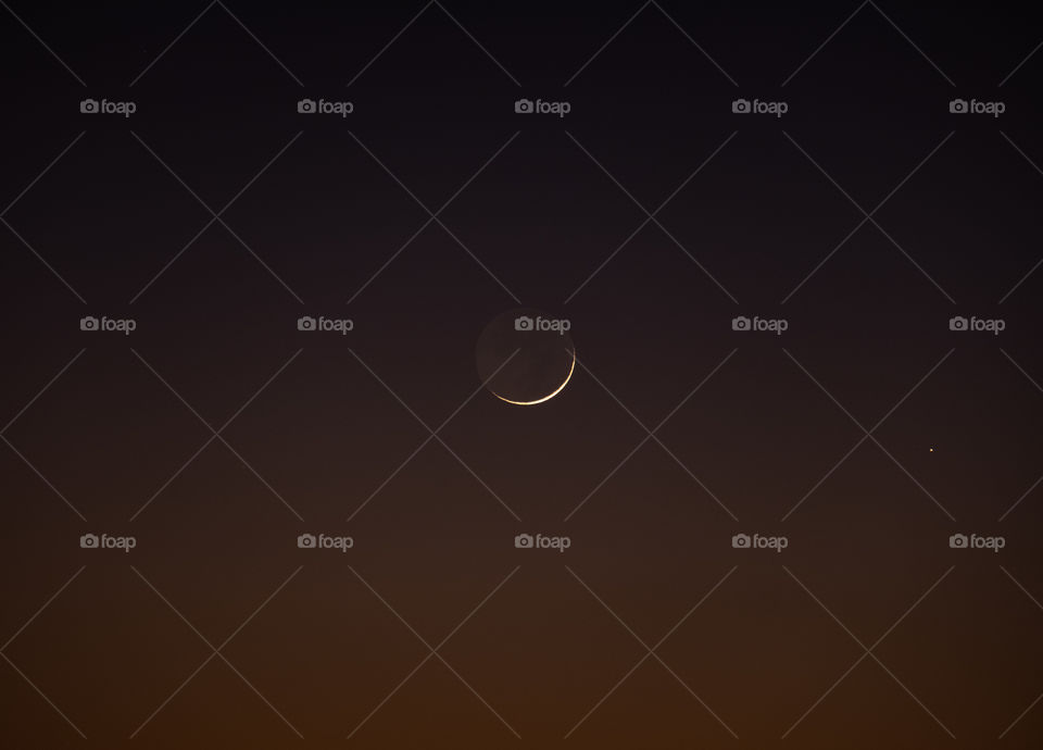 Crescent moon in White desert ,Egypt