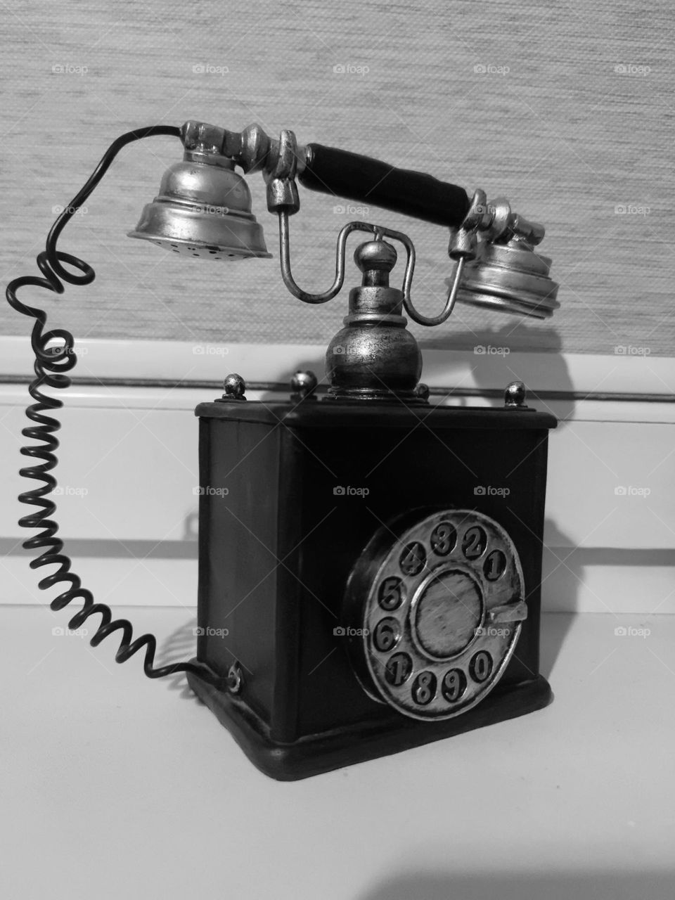 Senas telefonas taupyklė