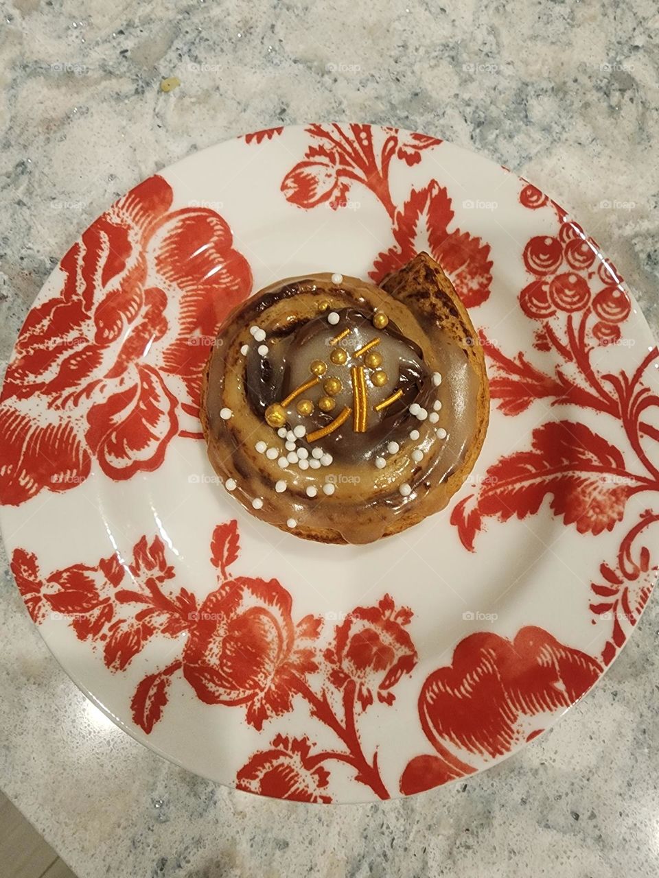 cinnamon roll with Nutella on a plate