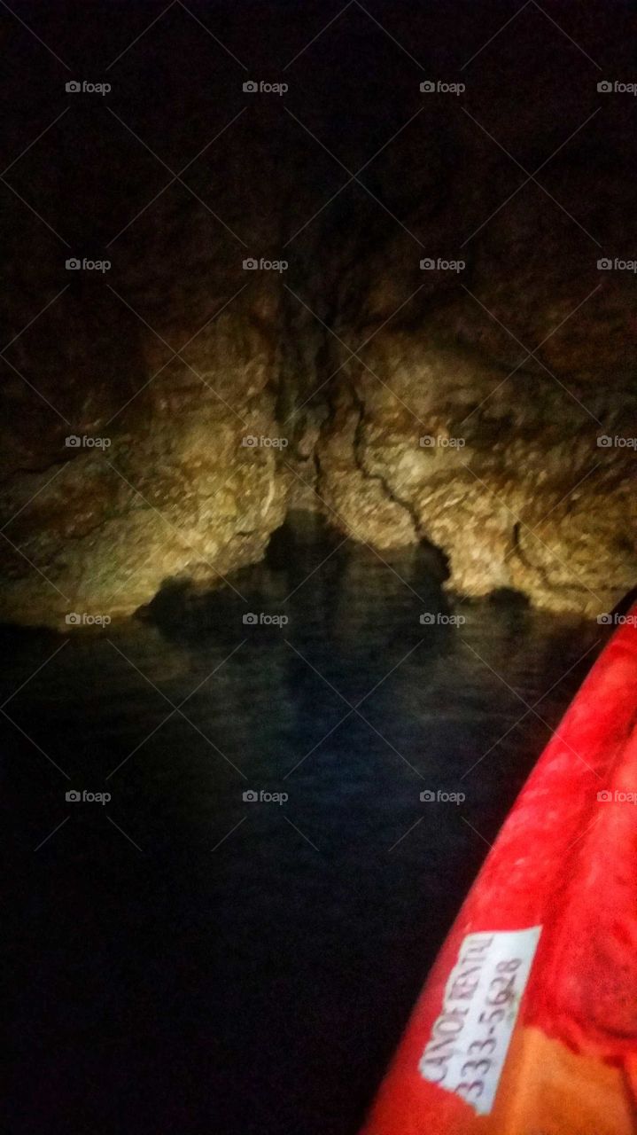 In a kayak, inside Cave Spring on Current river, the bottom is 150 straight down