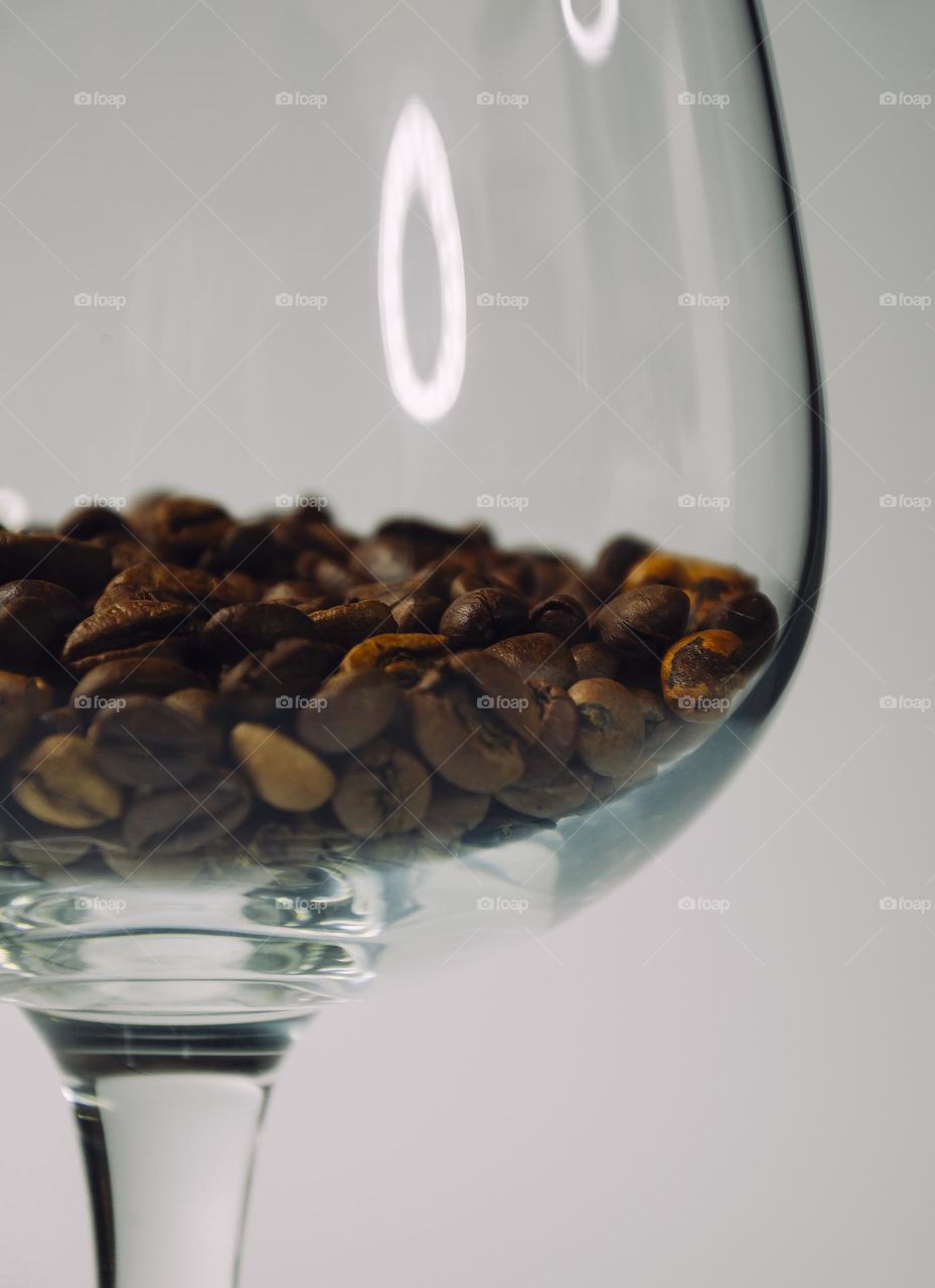 Coffee beans in a wine glass