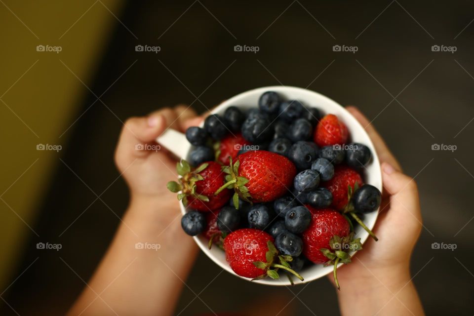 berries in a mug