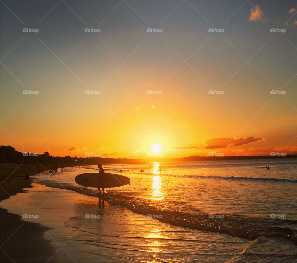 Surfer at Sunset on an Australian beach