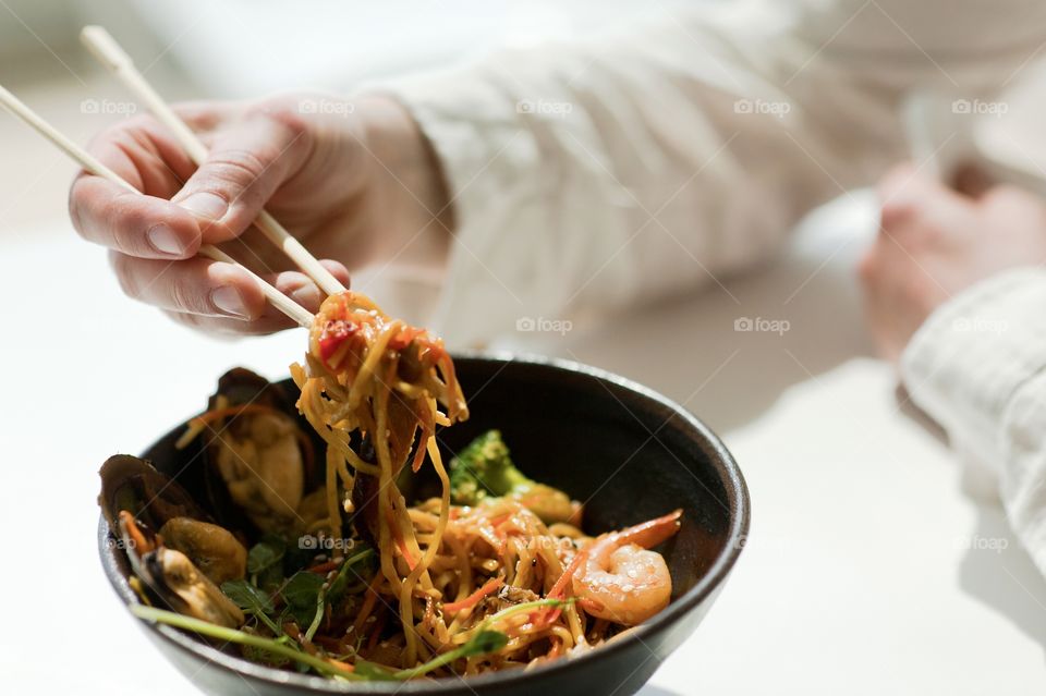 close-up of a plate with Asian cuisine