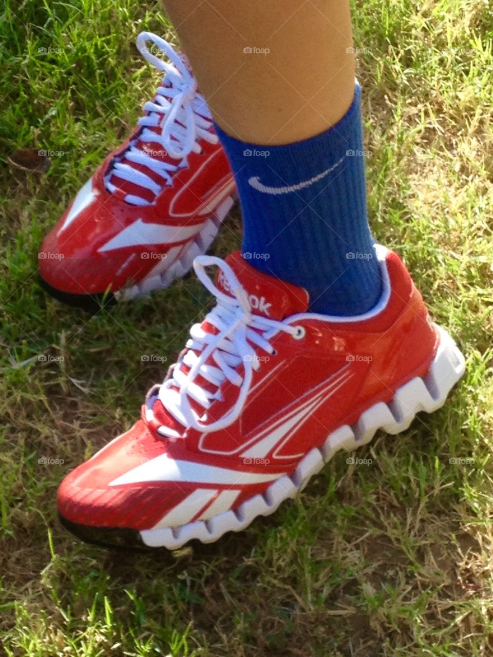Red baseball cleats . Red Reebok Zigs Cooperstown metal baseball cleats.