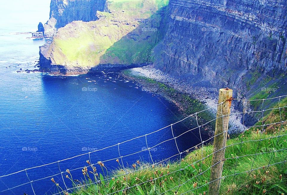 Cliffs of Moher, Ireland, fence along the edge 