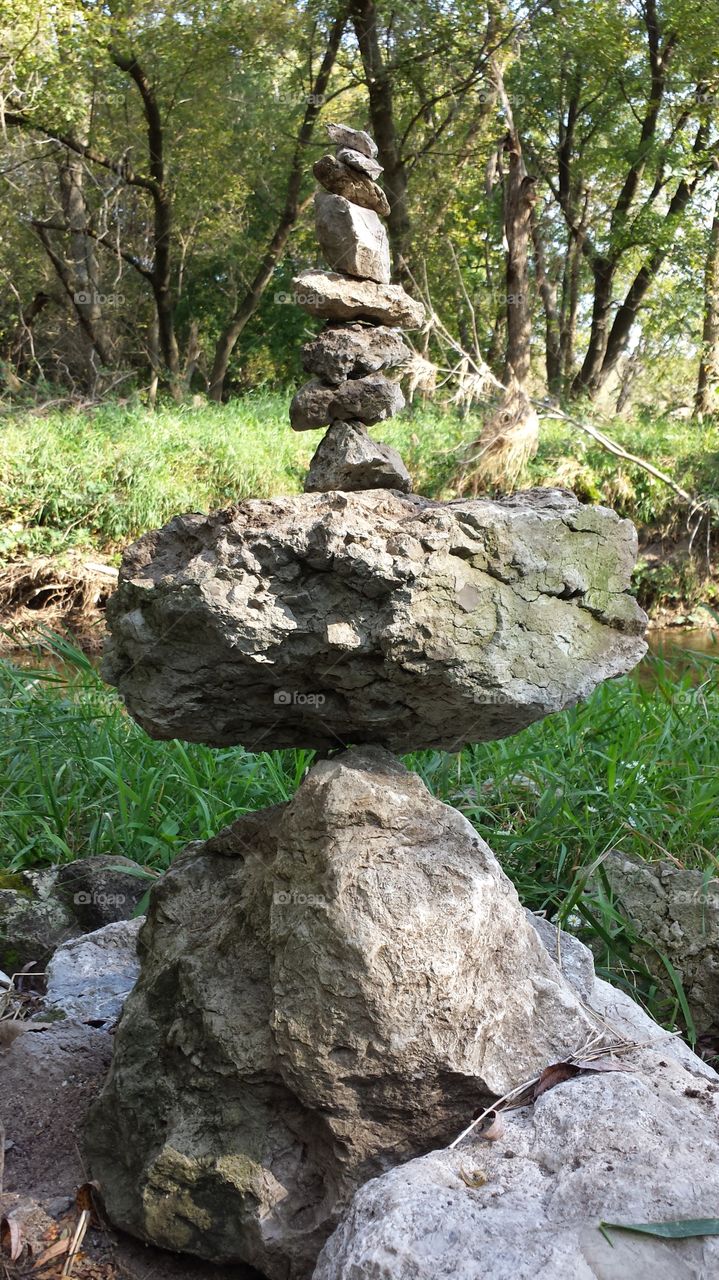 Close-up of a cairn in forest