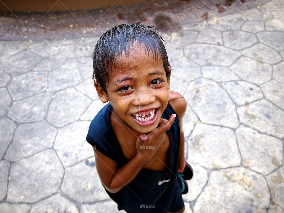 young asian kid smile for the camera