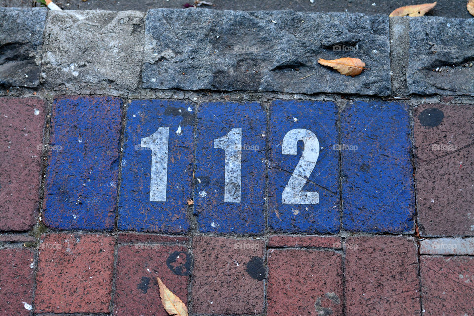 Numbers on Sidewalk