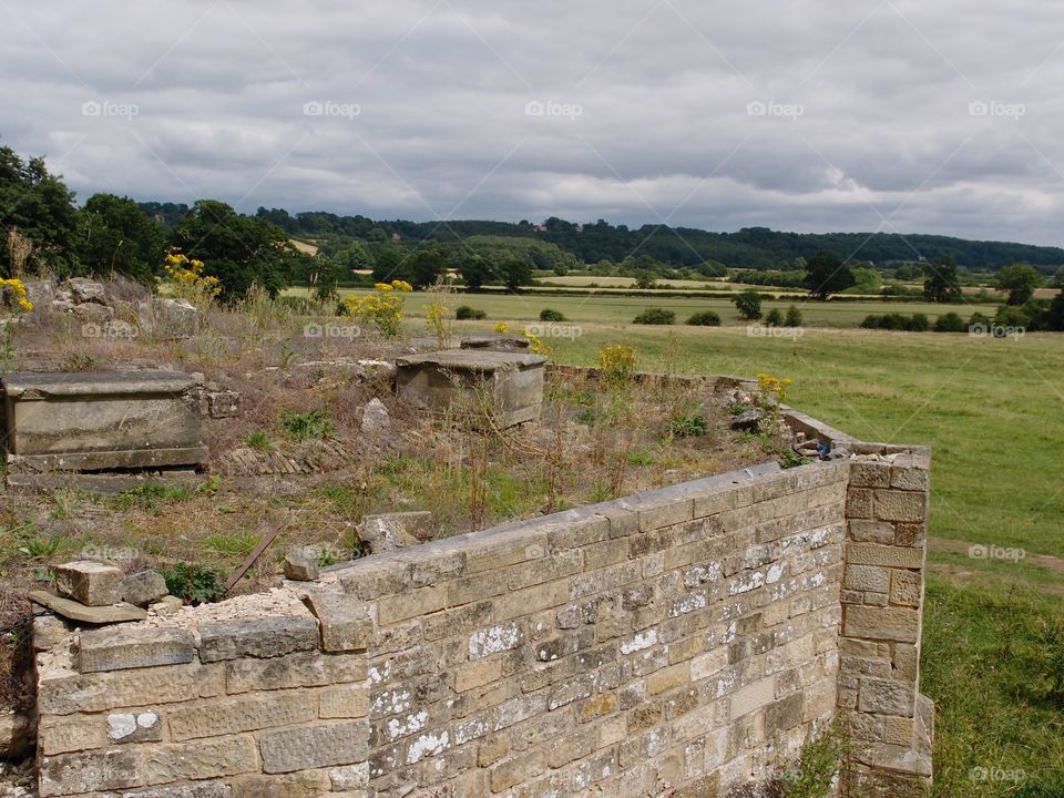 The remains of an old castle on the grounds of Castle Howard in the English countryside. 