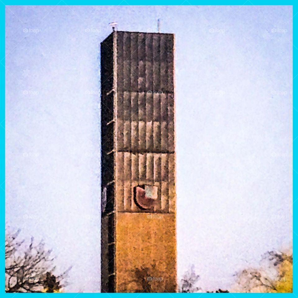 A TV station skyscraper from a distance in the evening time.