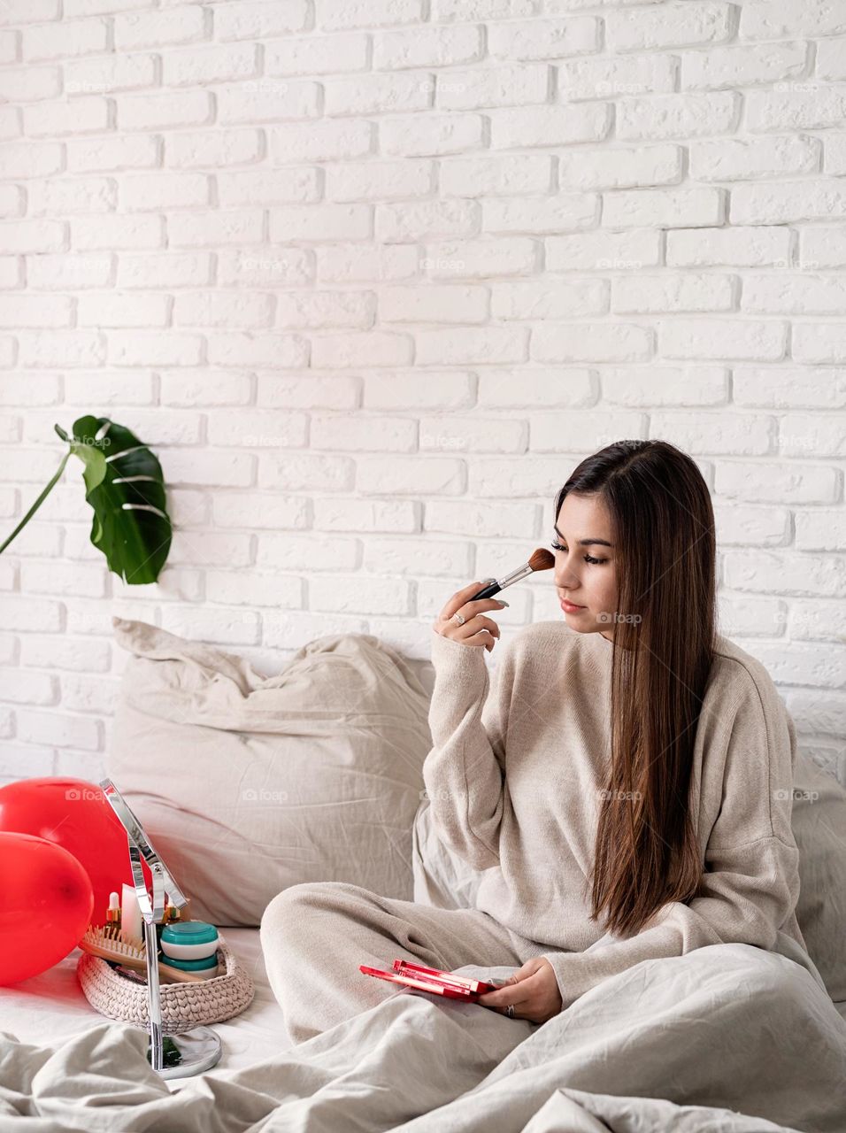 woman using cosmetics