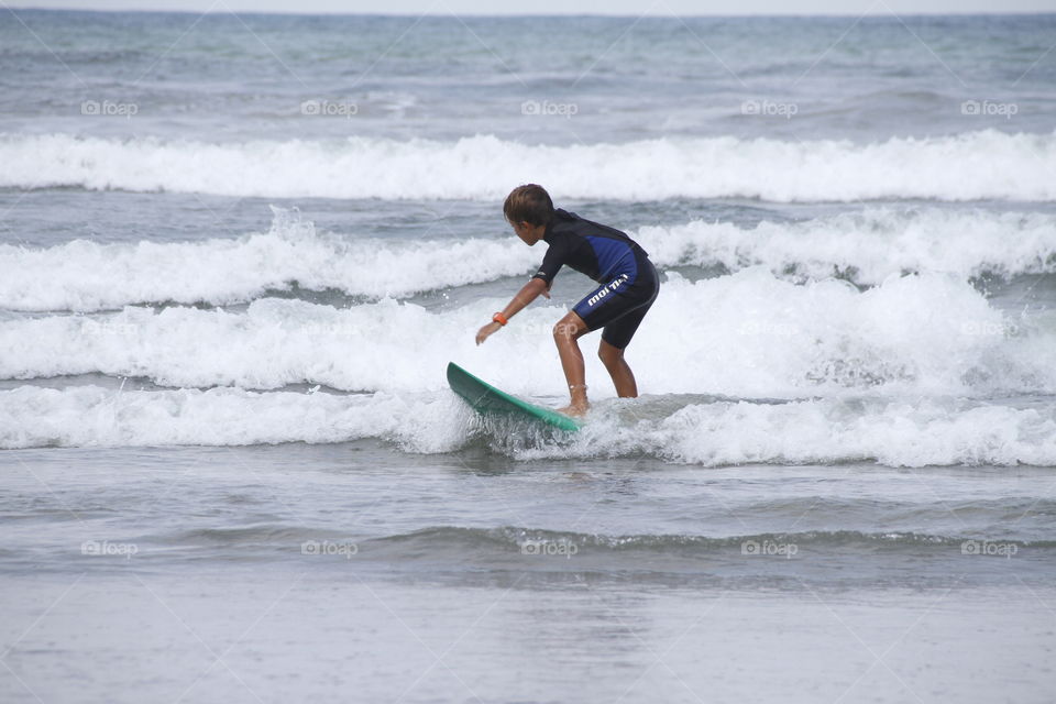 Boy with a surfboard