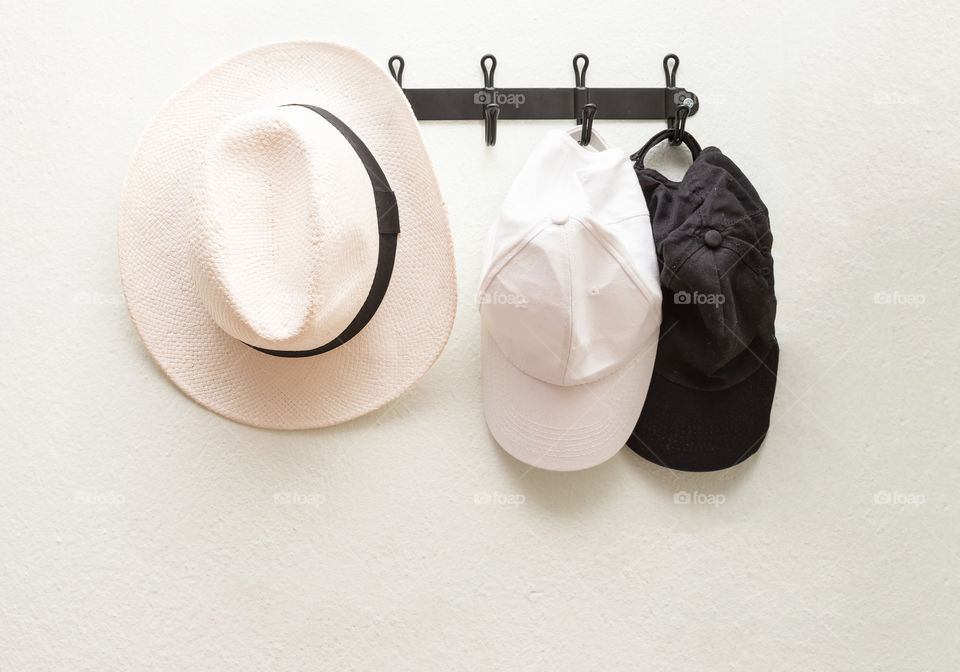Hats Hanging On The Wall
