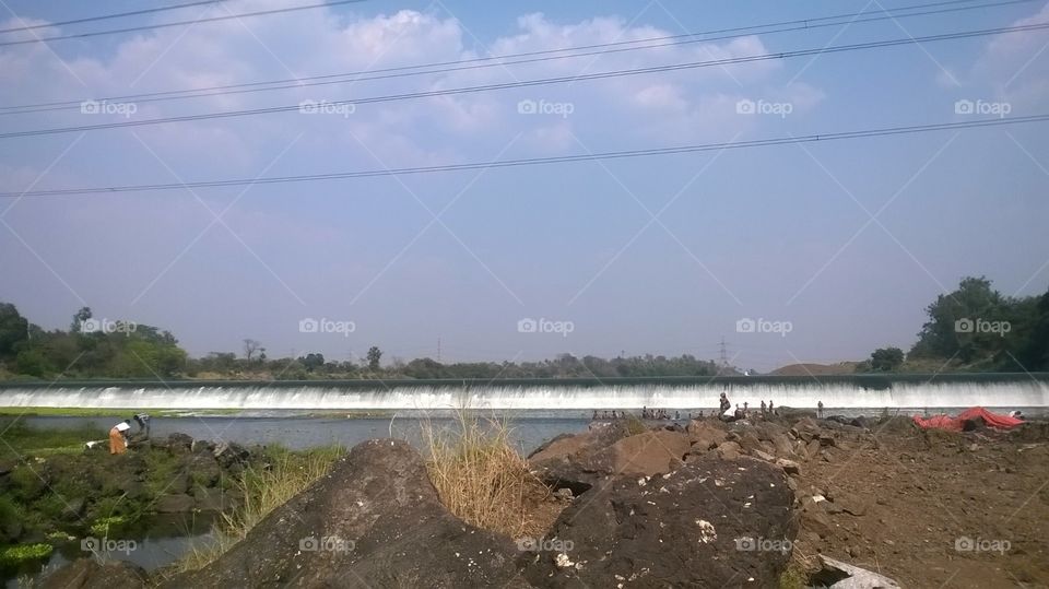 river water dammed in apti river