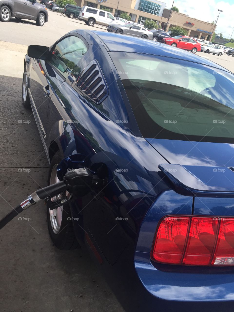 Refueling a Ford Mustang