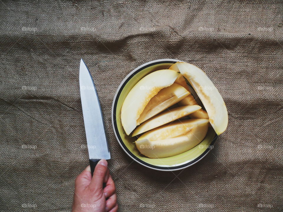 sliced ​​melon lie on the table