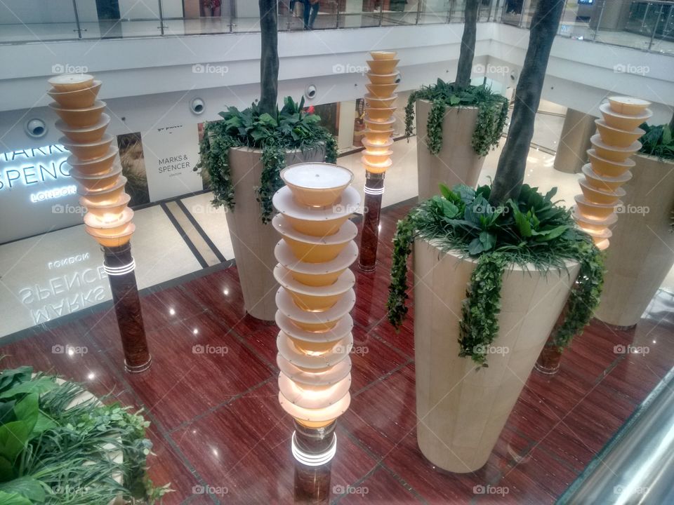 a big artificial trees and lights