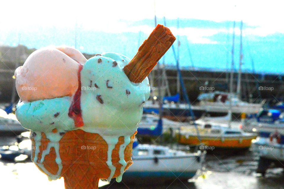 Hands holding ice cream 