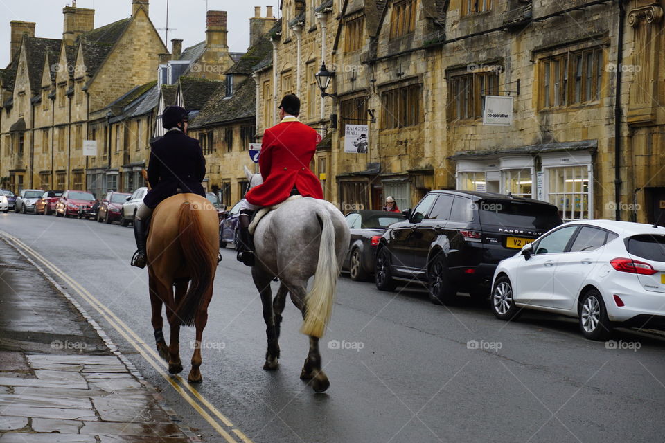 Horse riders returning from a traditional New Year Hunt in the Cotswolds ...