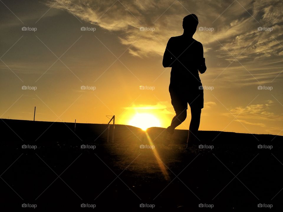 Silhouette of a man during sunset