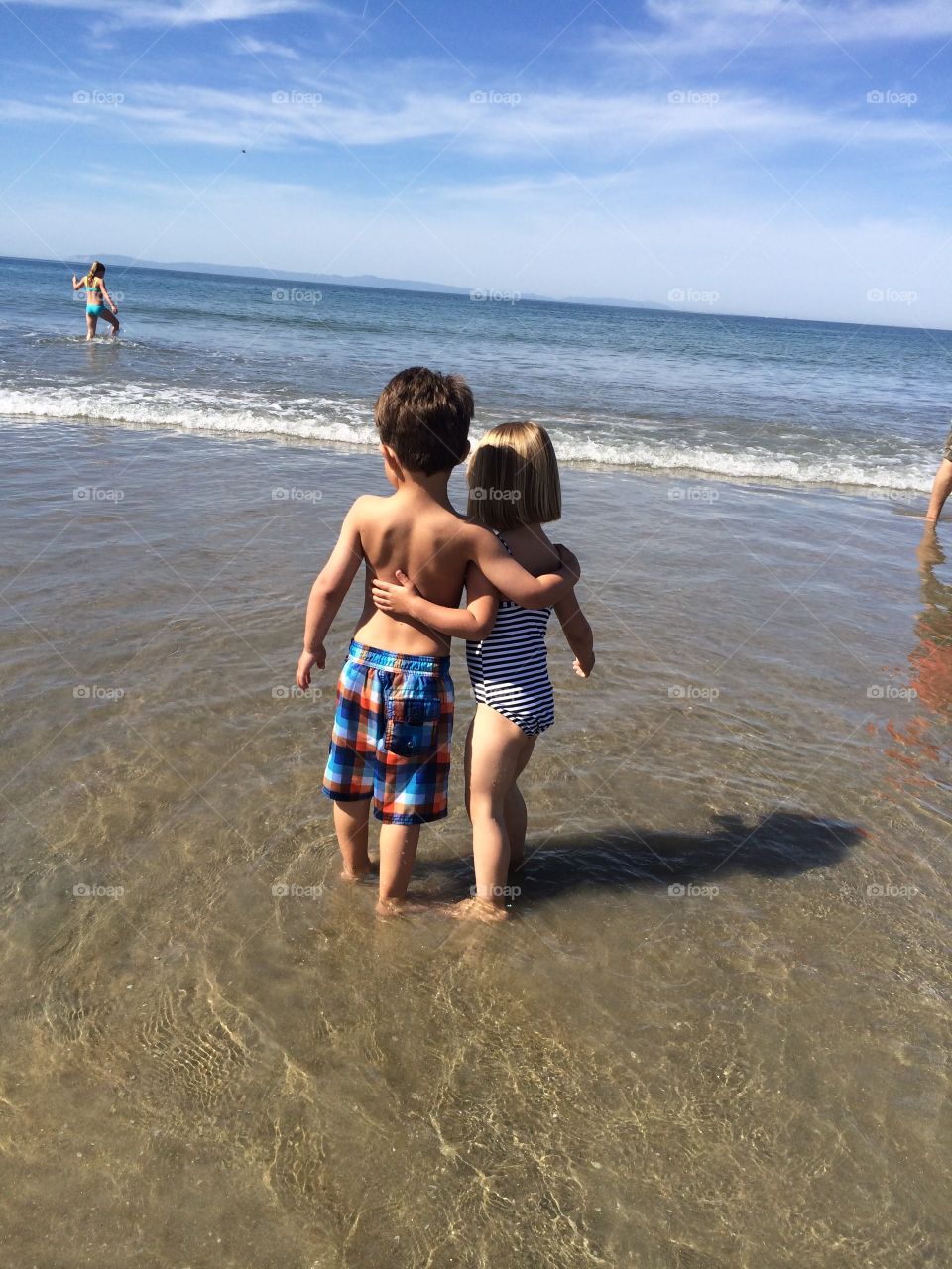 Beach Love. Brother and sister enjoying the beach.