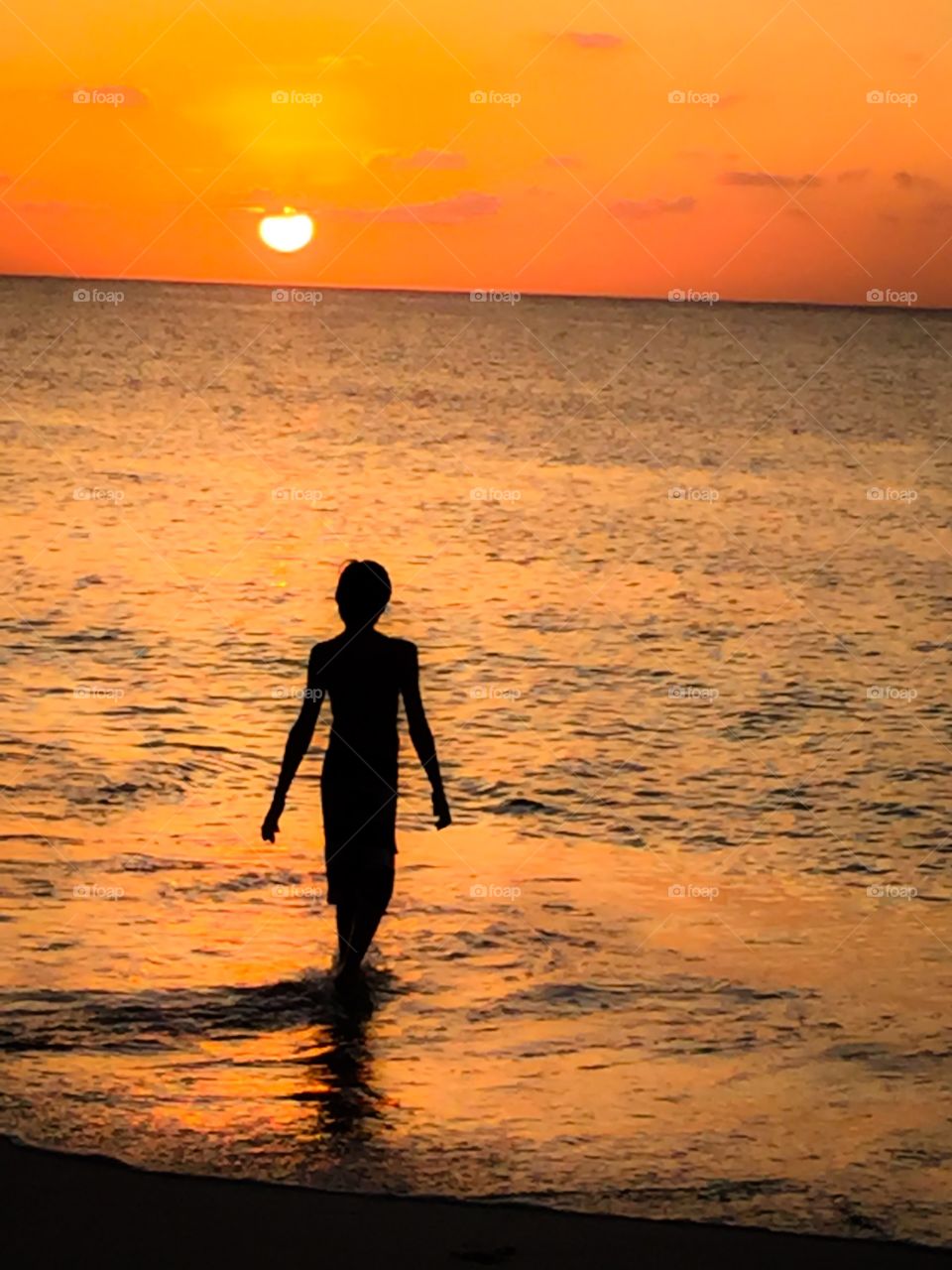 Boy in sunset 