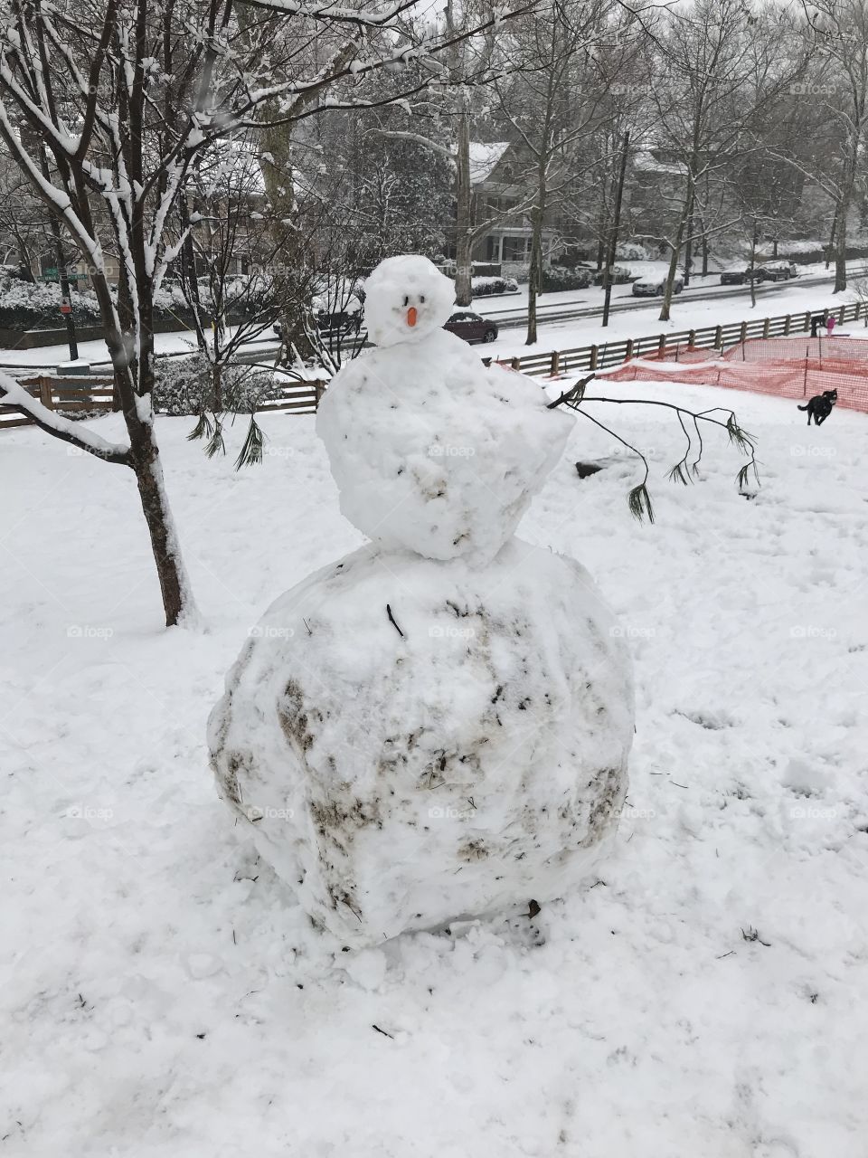 Just a big dirty snowman in the park