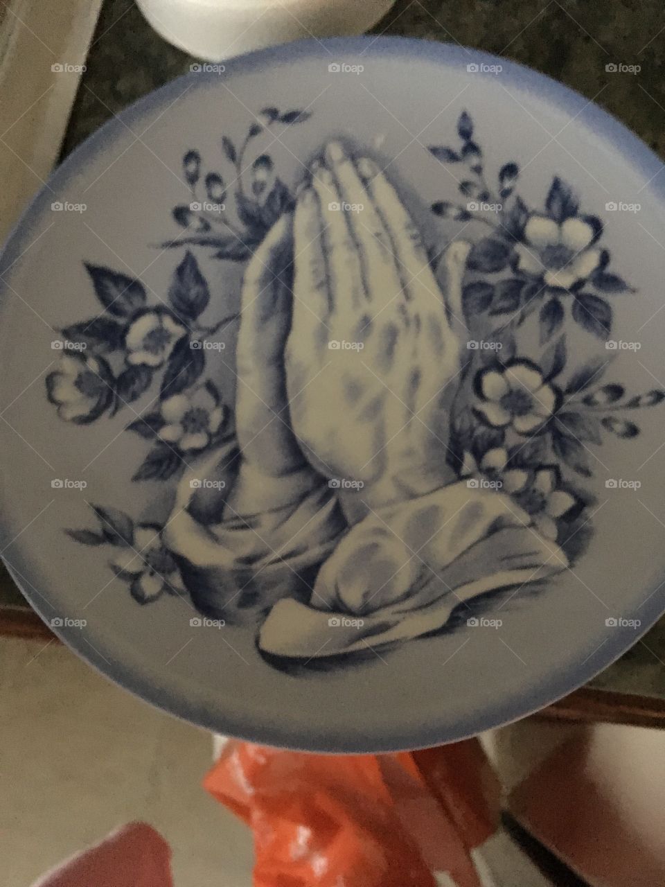 Found this the other day at a thrift store praying hands plate decorated in flowers 