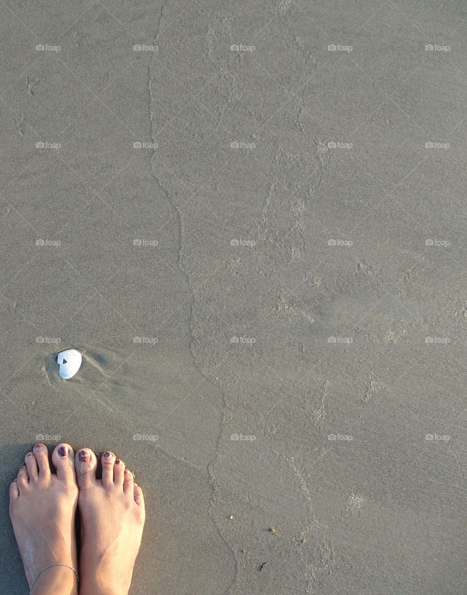 soaking sun light on the beach in summer