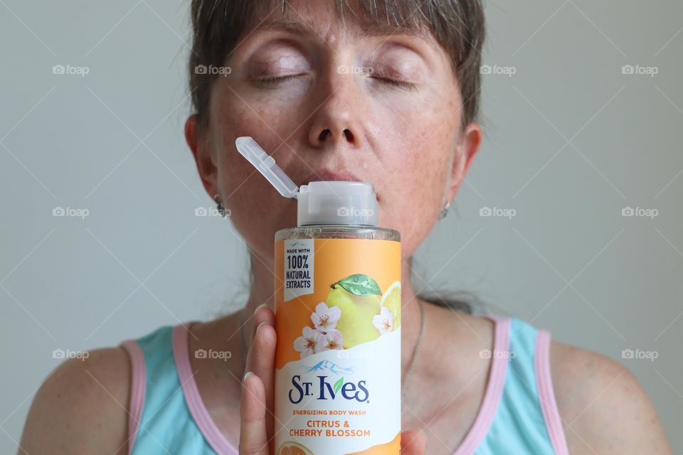 St.Ives Beauty product in woman's hands