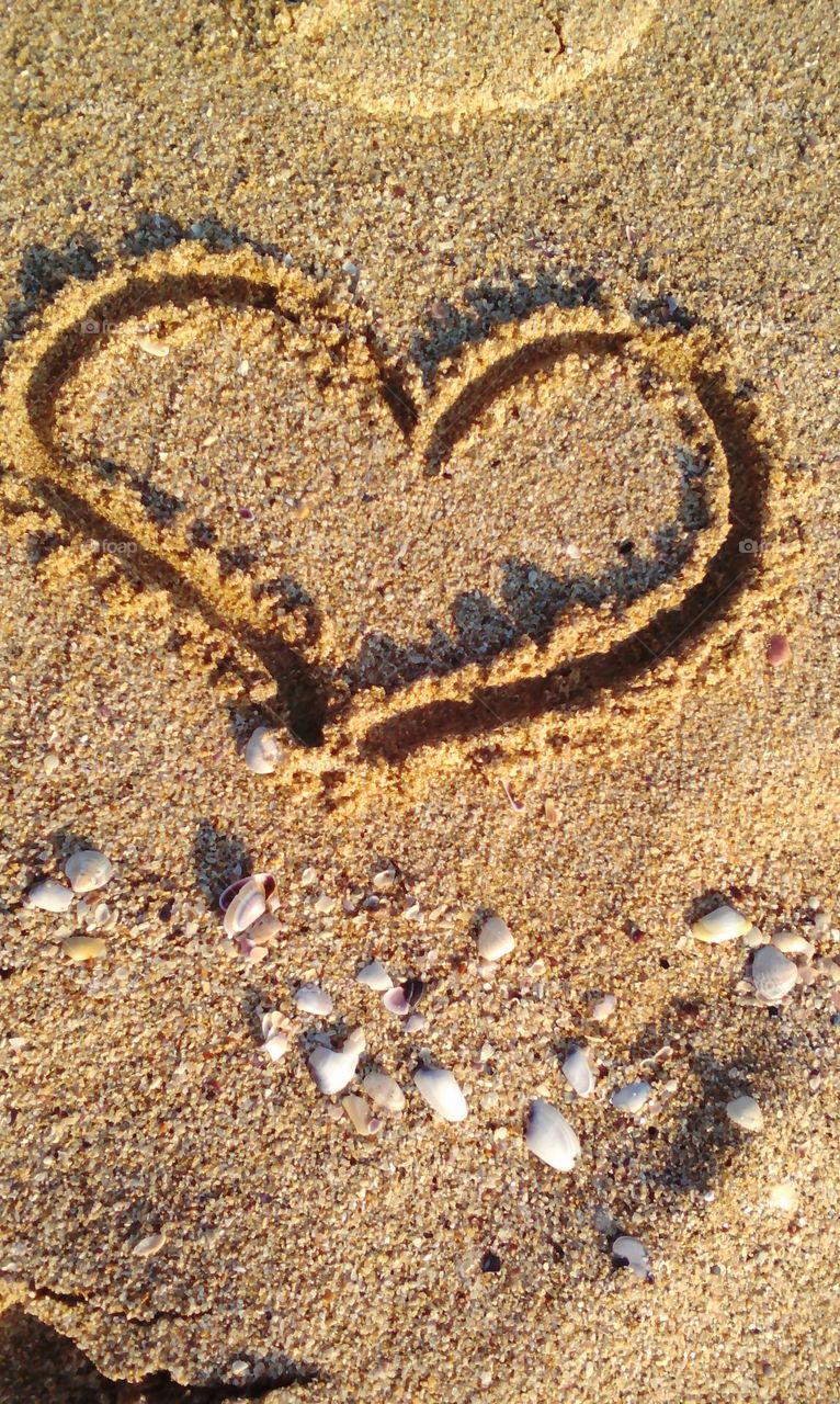 Heart at the sand