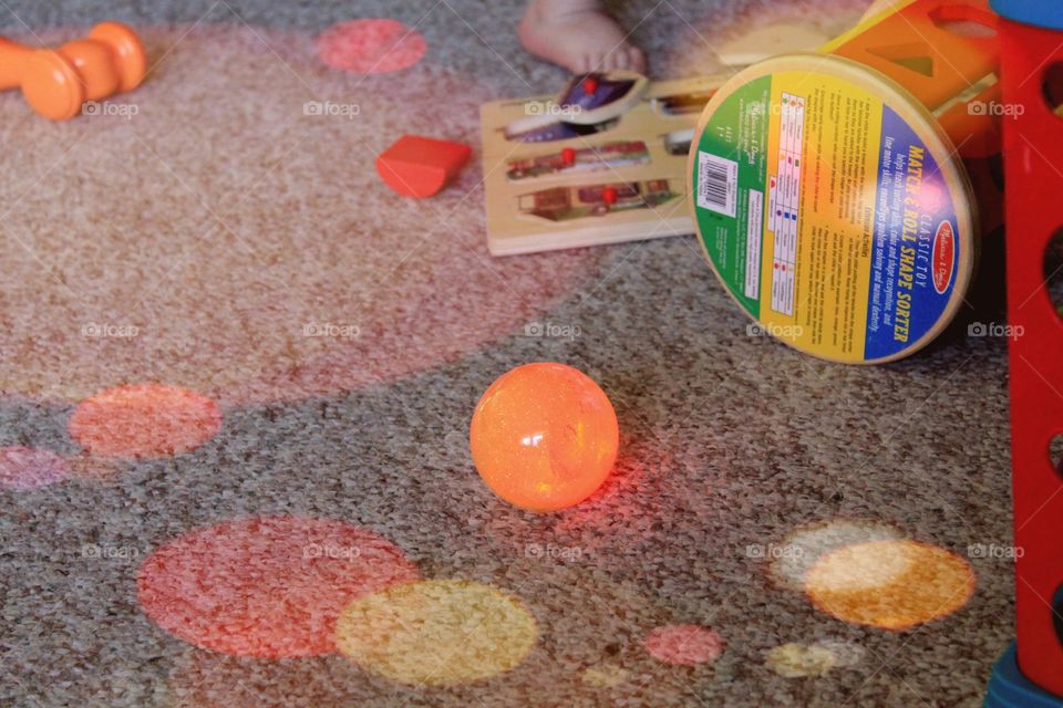 Bright colored baby toys with a "star" camera effect to add more pops of color.