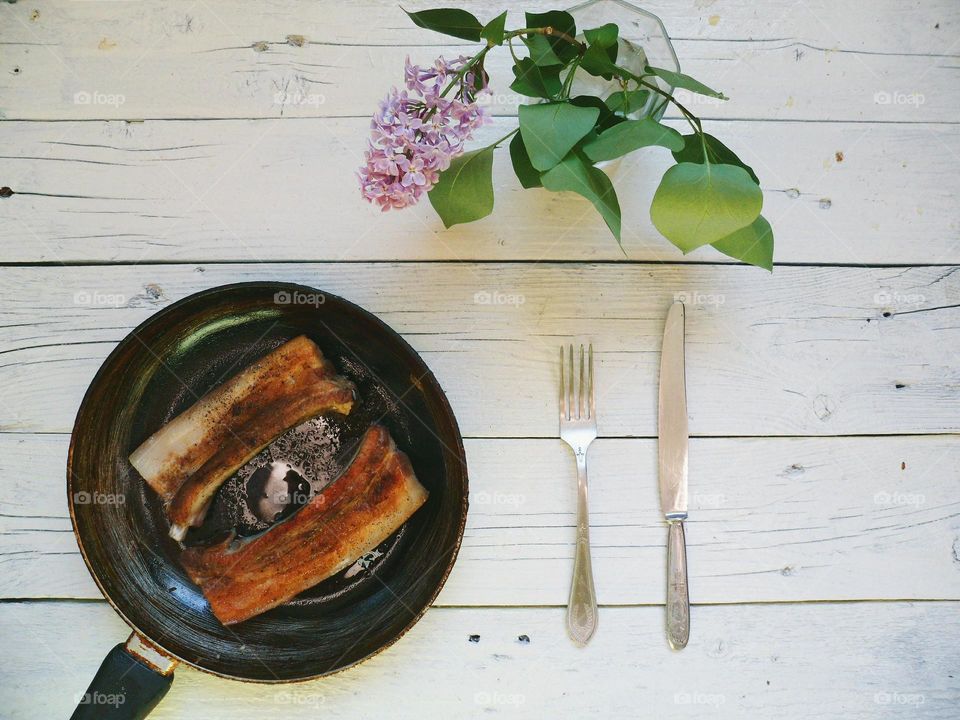 Roasted pork ribs in a pan