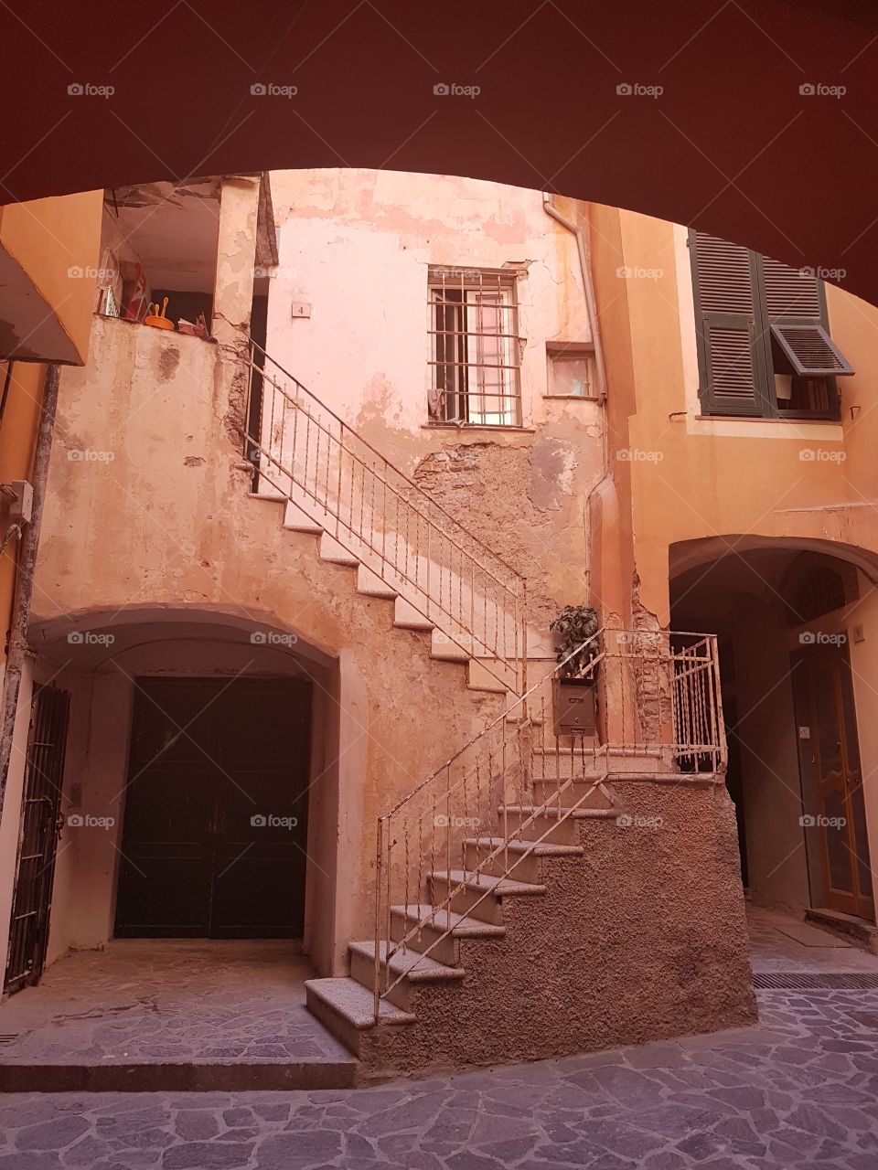 Courtyard of old houses in italian village
