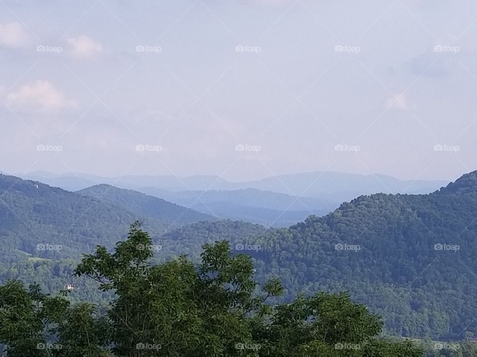 Blue Ridge Mountains. A majestic view of the mountains along with the blue hue characteristic of the name.