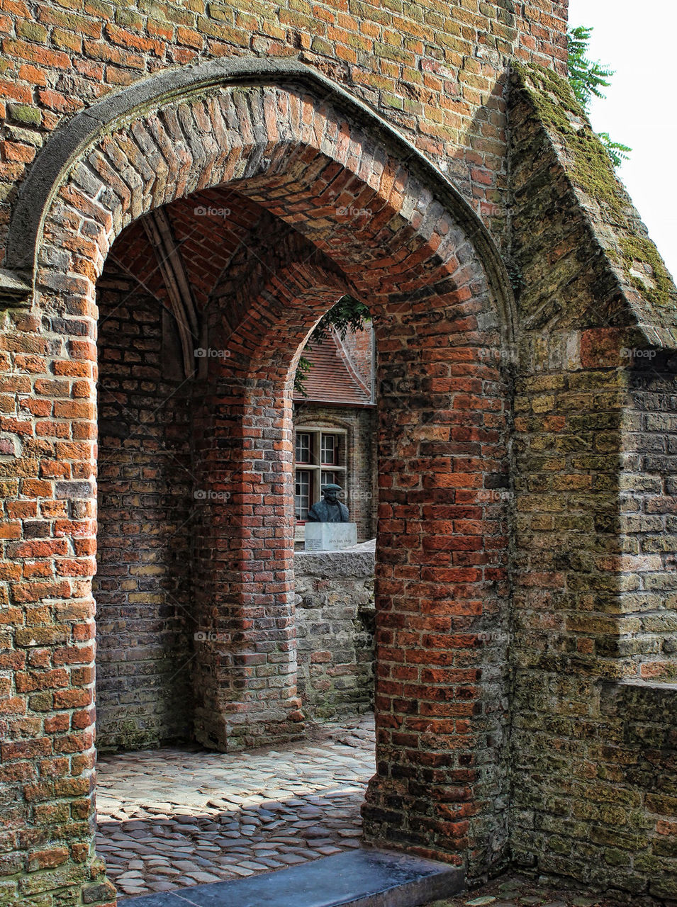 summer bruges cobbles arches by chris7ben