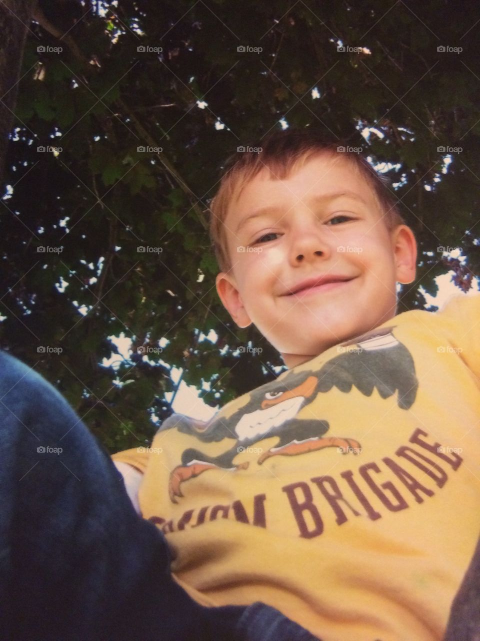 Low angle view of a cute boy