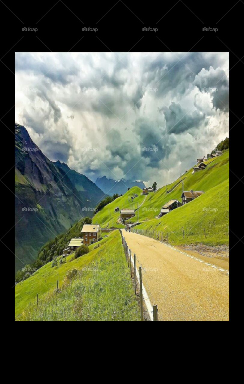 This is beautiful pictures of klaussen pass Switzerland of tourists place contains tree, mountains, grass, clear sky landscape, landmark photo of high quality HDR photo shoot can be used for wallpaper, magazines, Scene, and other activities, nature