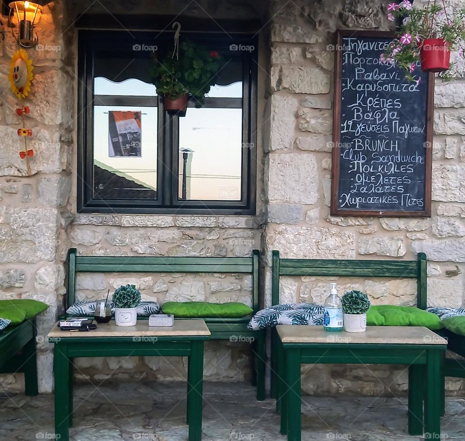 A cafeteria in a tranditional  village of Greece