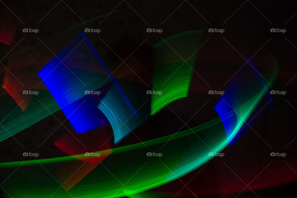 Drawing with light, abstract patterns with light, on a black background