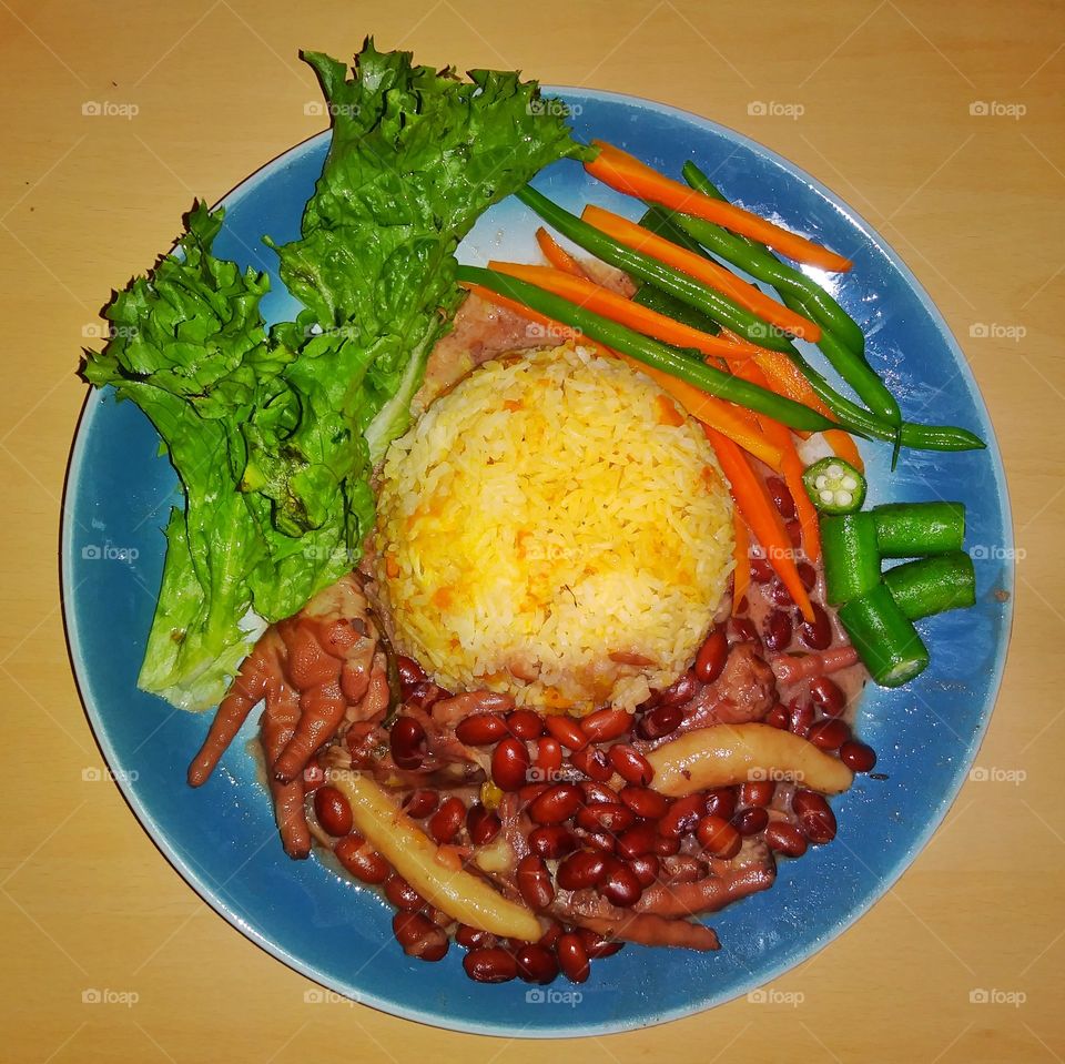 Jamaican stew peas and pumpkin rice with vegetable