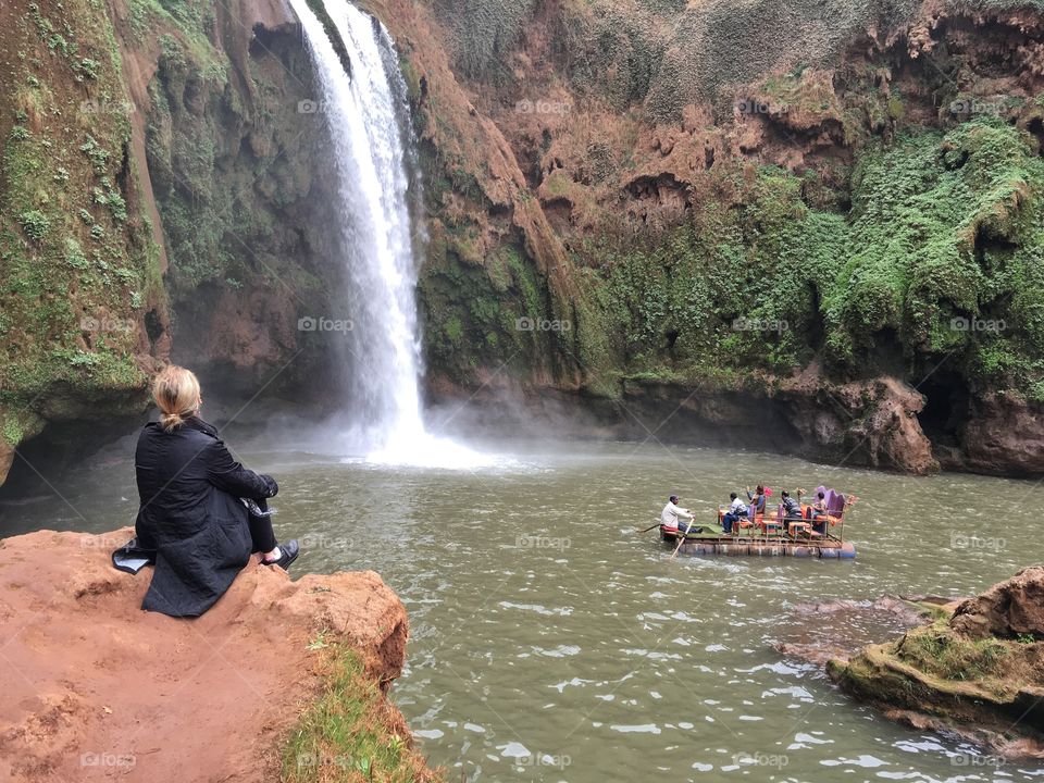 Relaxing by a waterfall 