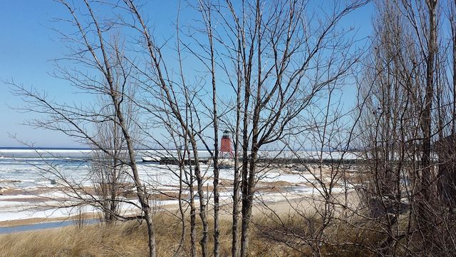 Lighthouse. driving along lake Michigan in Charleviox