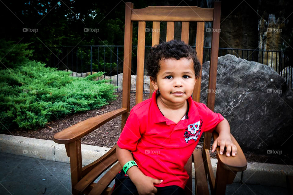 Small Boy In Rocking Chair at Kings Dominion