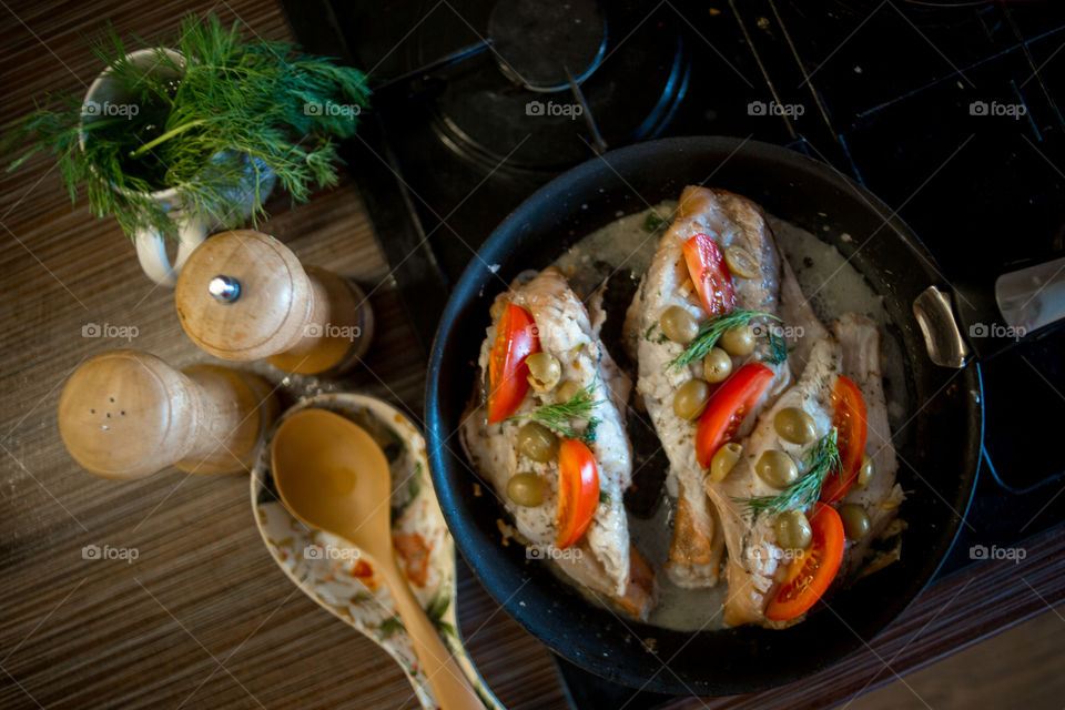 Dish with Sea bass fried with vegetables 