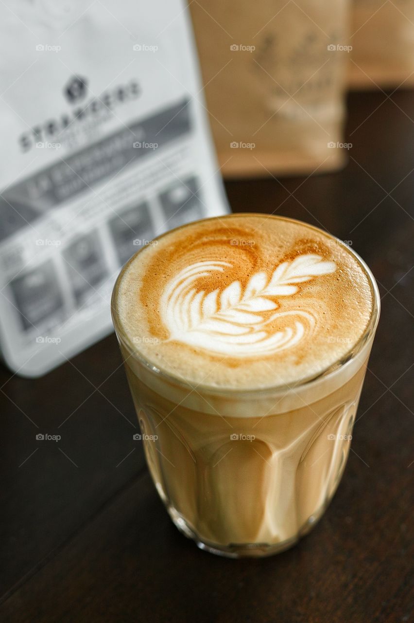 Coffee Latte closeup shot in cafe.